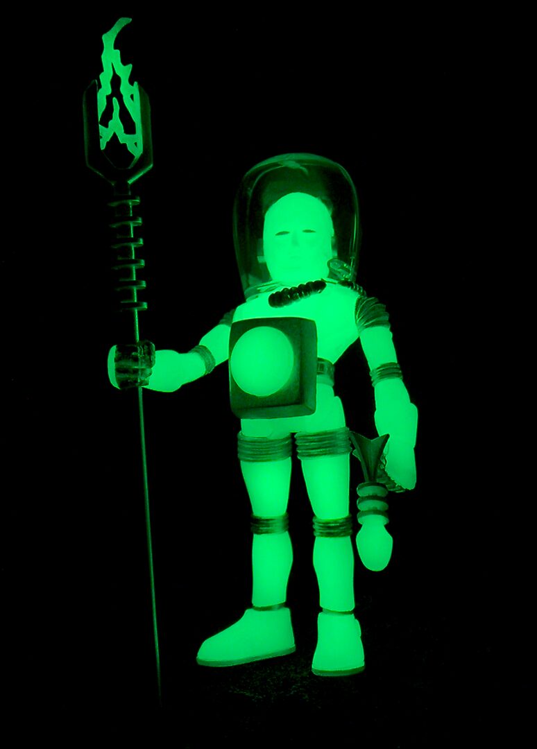 A green ELECTRON+ COSMIC RADIATION figure holding a torch.