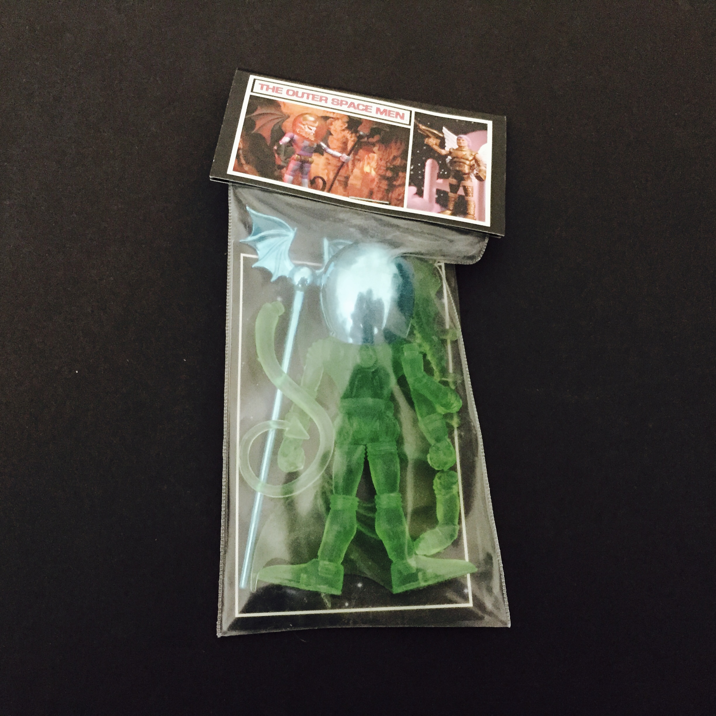 A 2011 GALACTIC HOLIDAY MYSTRON GREEN WITH BLUE ACCESSORIES plastic figure in a package.