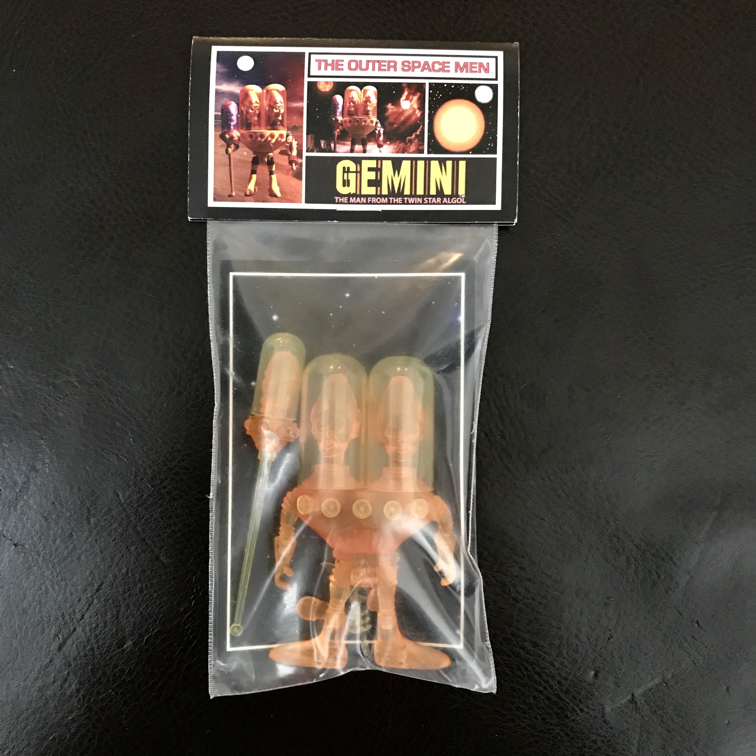 A package with a 2012 GEMINI EXCLUSIVE NEW YORK COMIC CON SEALED IN FACTORY BAG in it.
