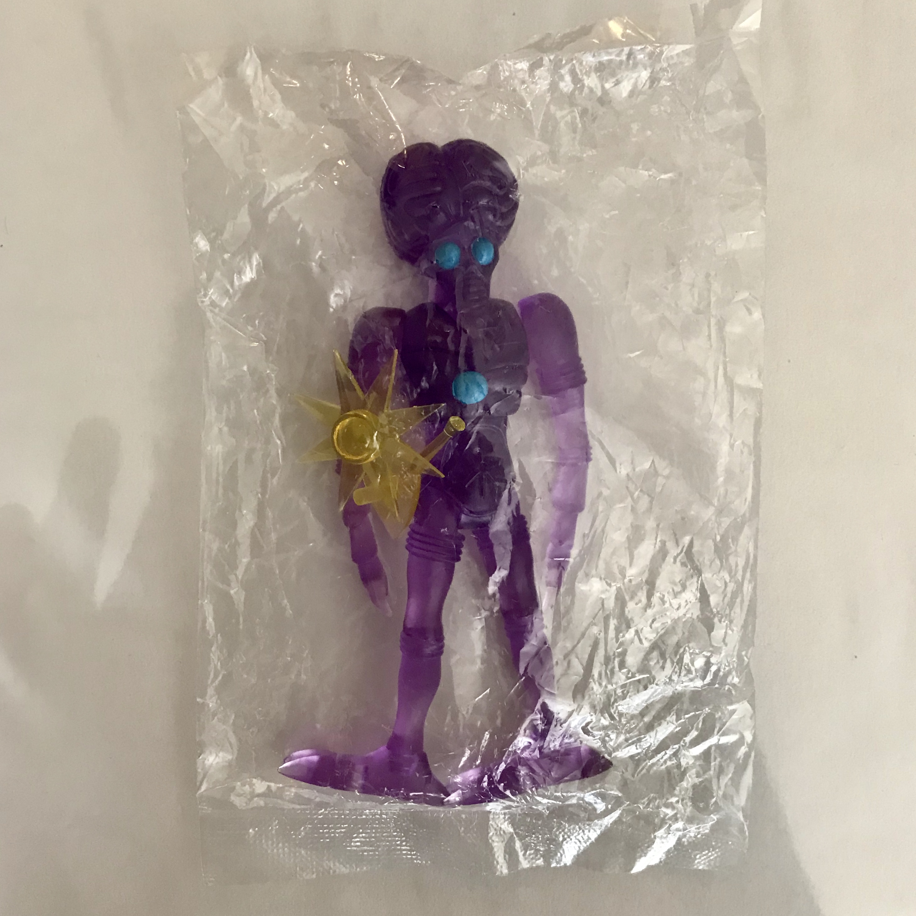 A 2012 ORBITRON EXCLUSIVE NEW YORK COMIC CON SEALED IN FACTORY BAG sitting in a plastic bag.