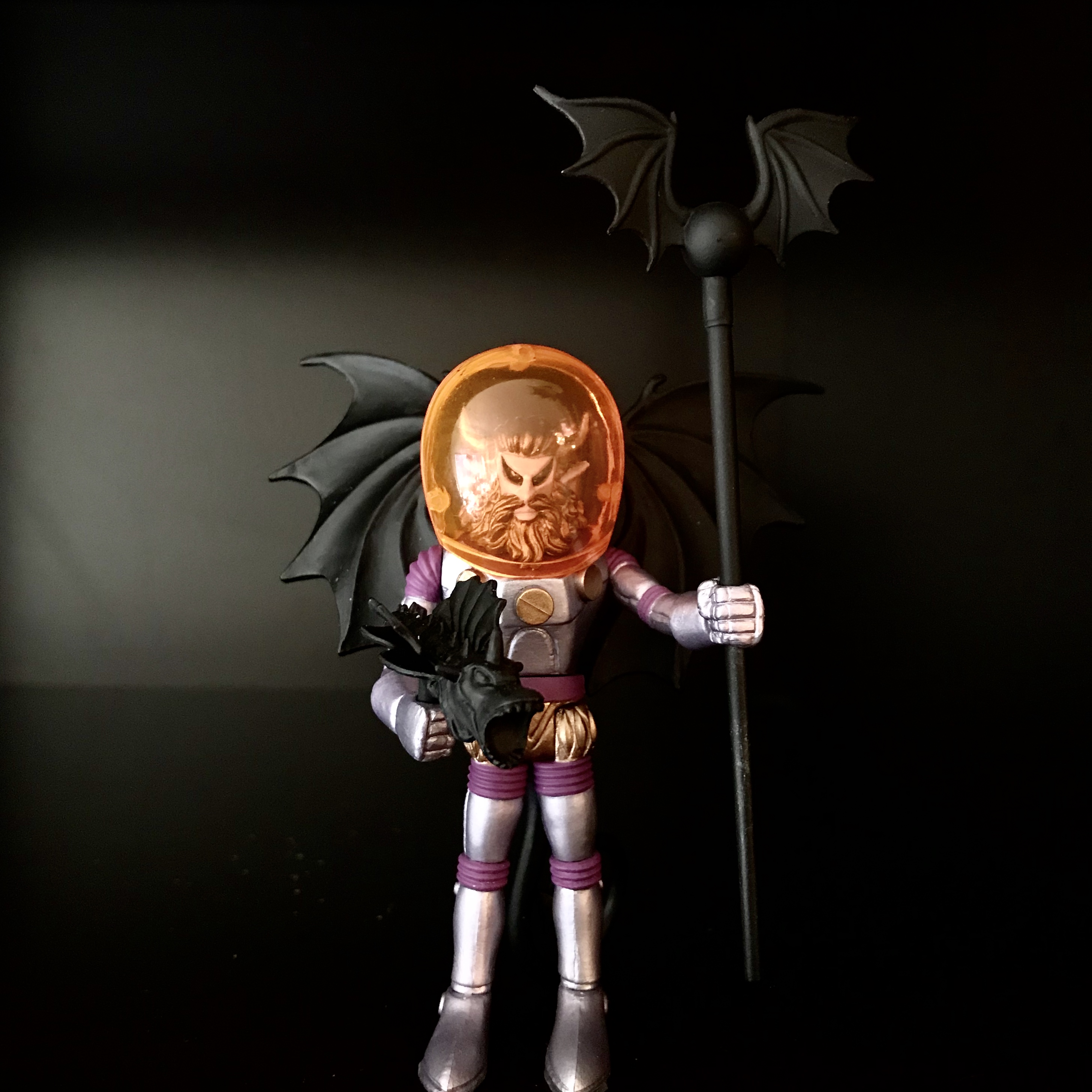 A 2011 MYSTRON INFINITY PAINTED 1968 VERSION LOOSE FIGURE with a bat and a scythe.