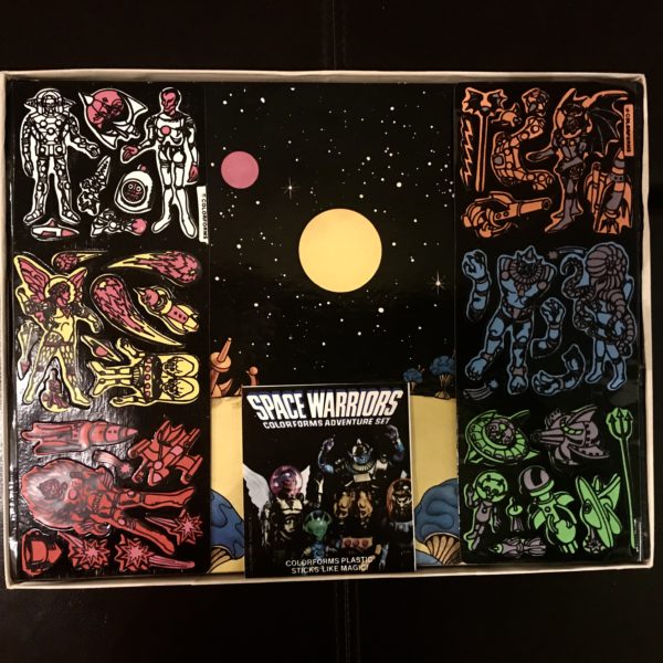 A 1977 COLORFORMS SPACE WARRIORS PLAYSET EXCELLENT SHAPE AND UN-- USED on a table.