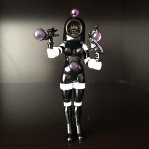 A 2013 OHPROMATEM INFINITY LOOSE FIGURE GEM MINT NEVER PLAYED WITH holding a purple ball.