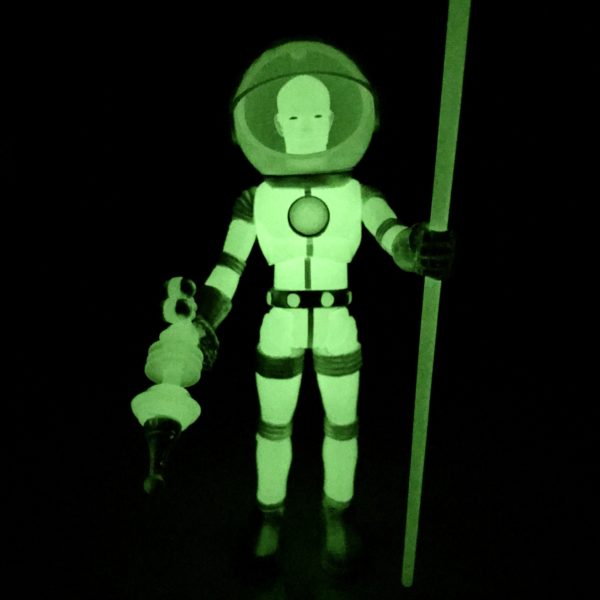 A 021 CTHULHU COSMIC RADIATION glow in the dark figure holding a stick.