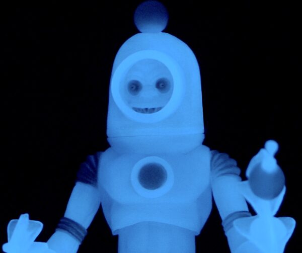 A 2019 ASTRO NAUTILUS BLUESTAR EDITION robot figure that glows in the dark with a blue hue.