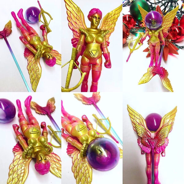 A series of pictures of a 2019 GALACTIC HOLIDAY EDITION TOPHEROY EDITION action figure.